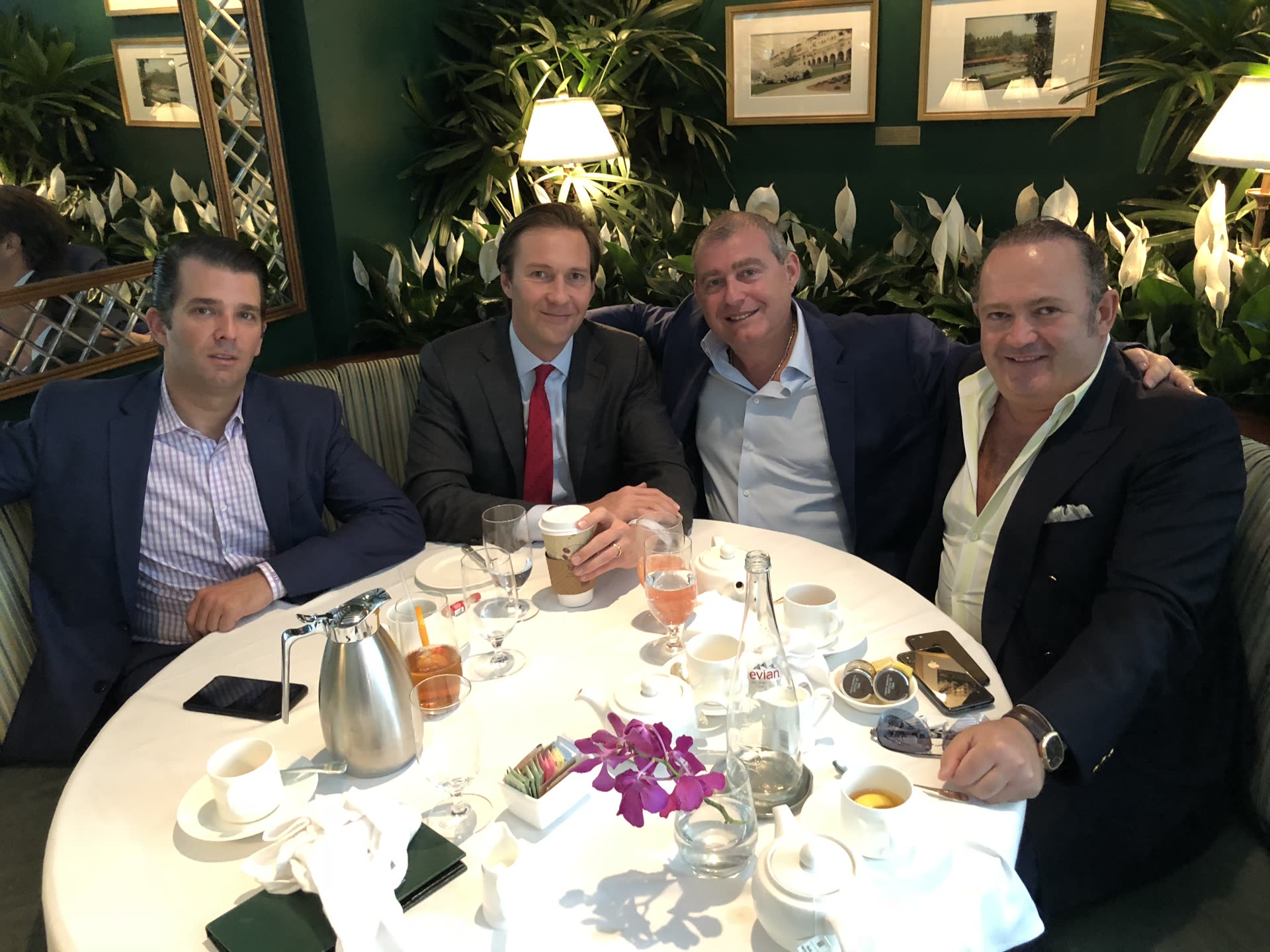 Lev Parnas at a table with Donald Trump Jr. and others in Beverly Hills, 2018