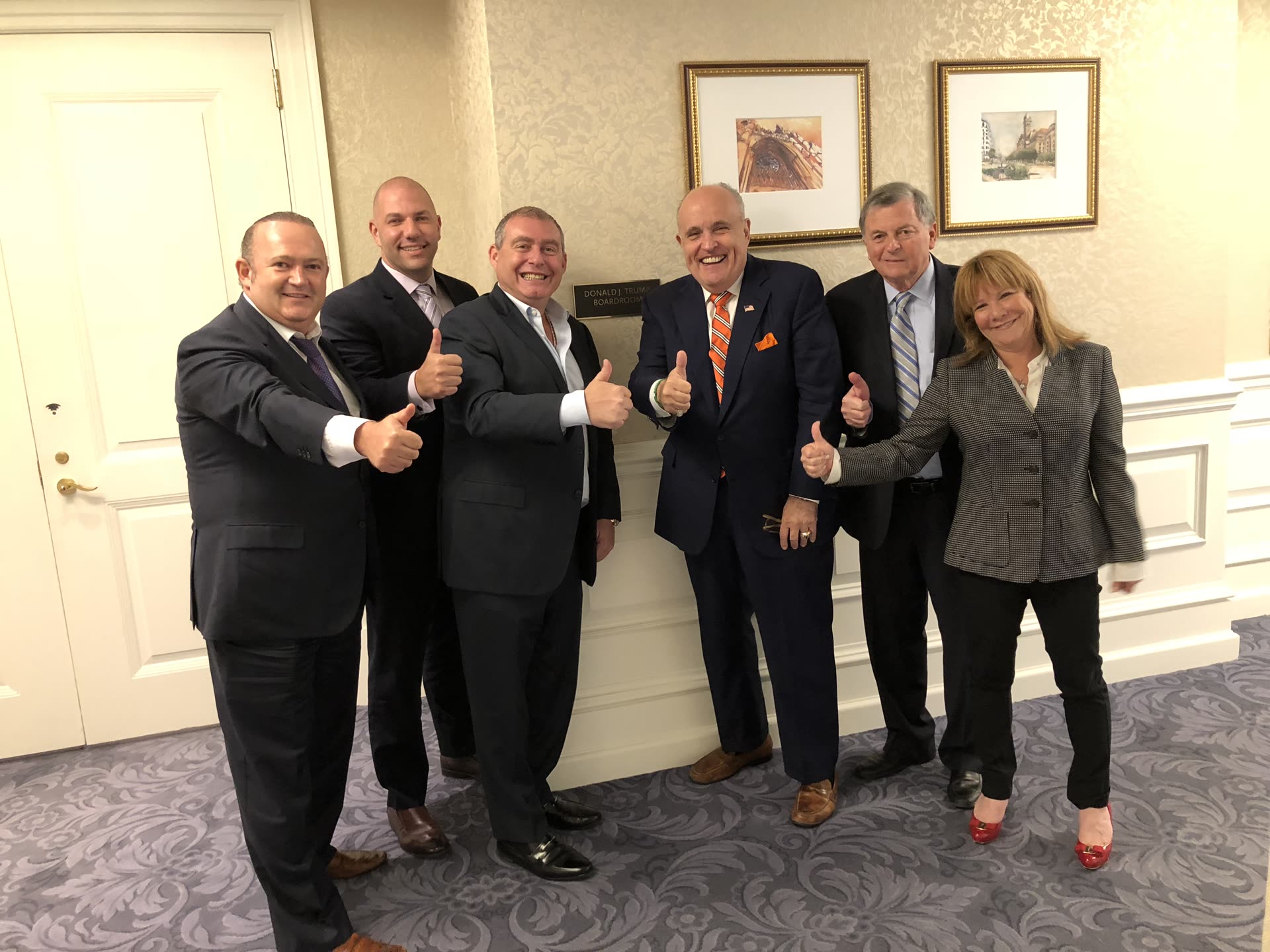 Lev Parnas with Rudy Giuliani and others giving a thumbs up